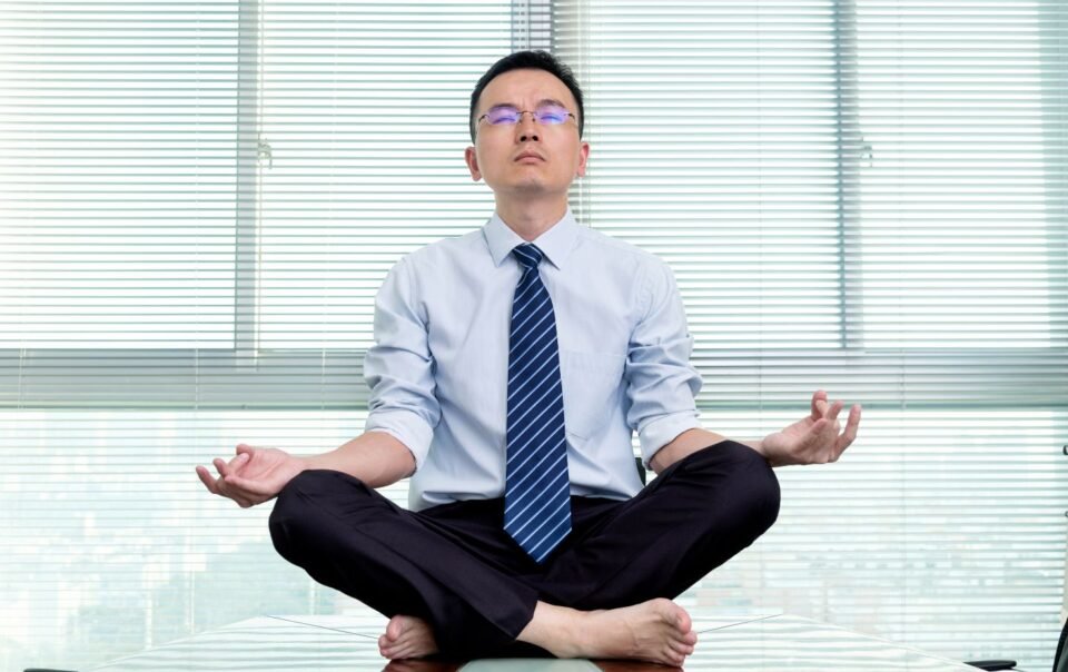 a man practicing Non reaction meditation at work in an extreme way.