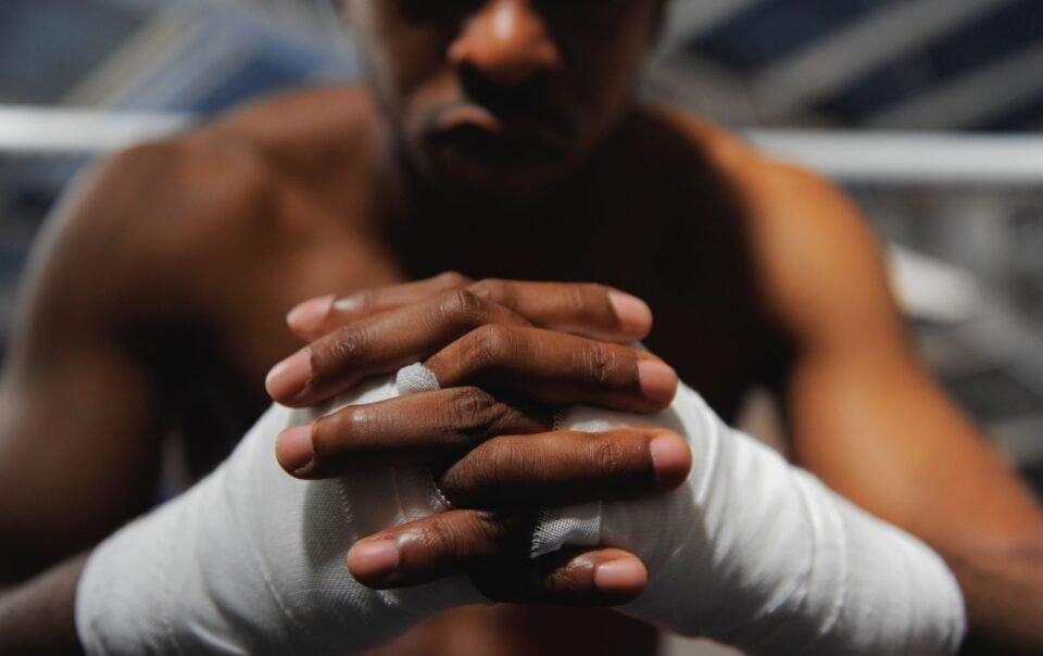 A boxer who has positive delusion mindset shown with confidence fueling goal achievement