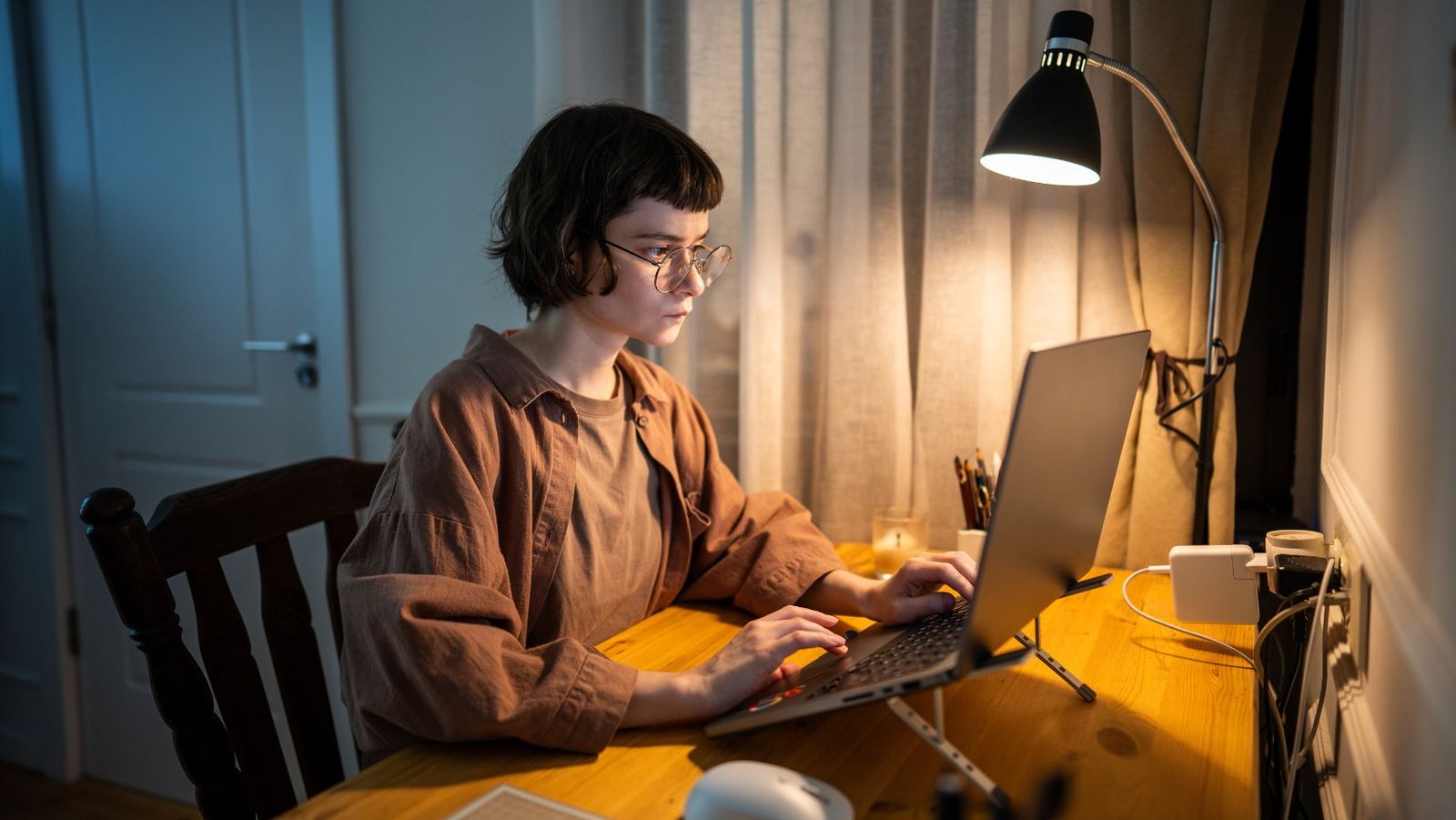 Woman working alone consistently without motivation in a calm environment