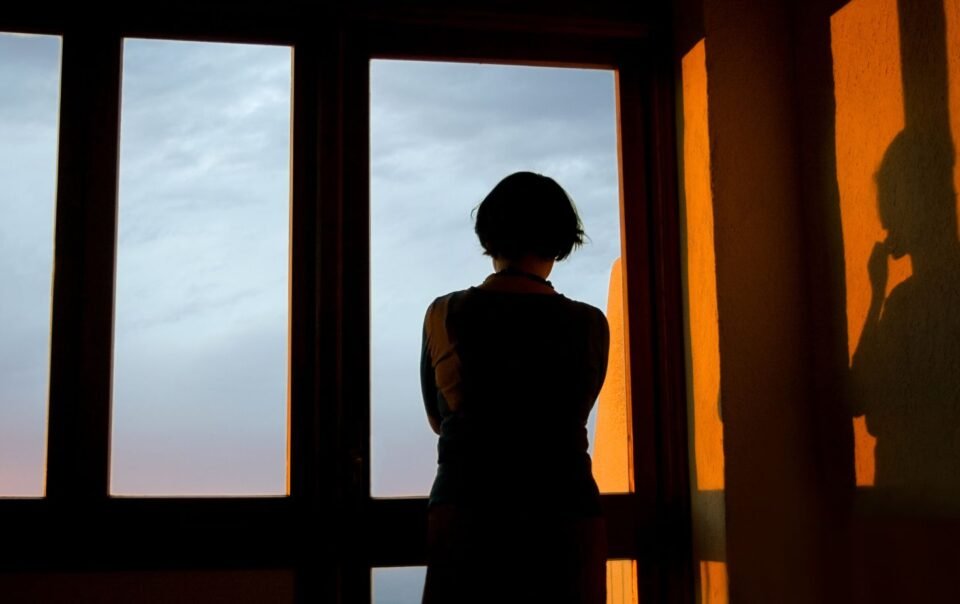 Person reflecting deeply and understanding how your beliefs affect your behavior