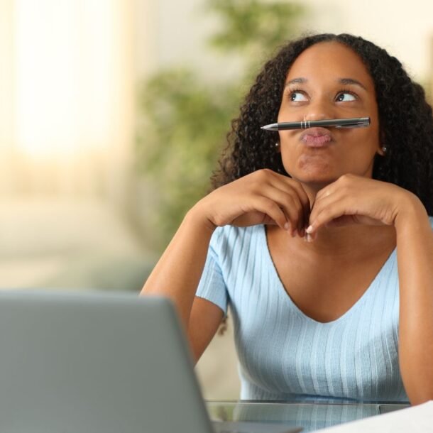 Person procrastinating and avoiding work despite knowing it matters