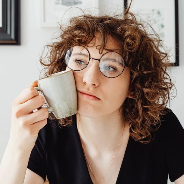 Woman thinking deeply before taking action and delaying progress