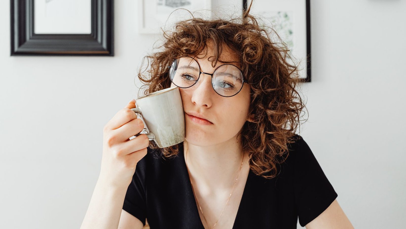 Woman thinking deeply before taking action and delaying progress